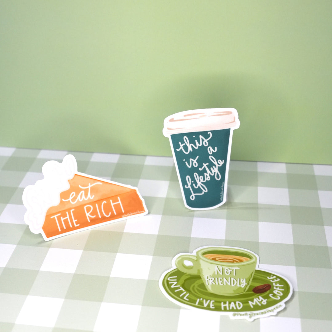 This is a Lifestyle Coffee Cup Vinyl Sticker