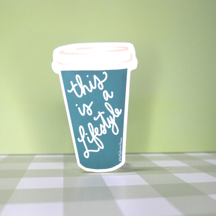 This is a Lifestyle Coffee Cup Vinyl Sticker