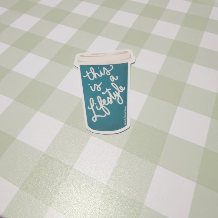 This is a Lifestyle Coffee Cup Vinyl Sticker
